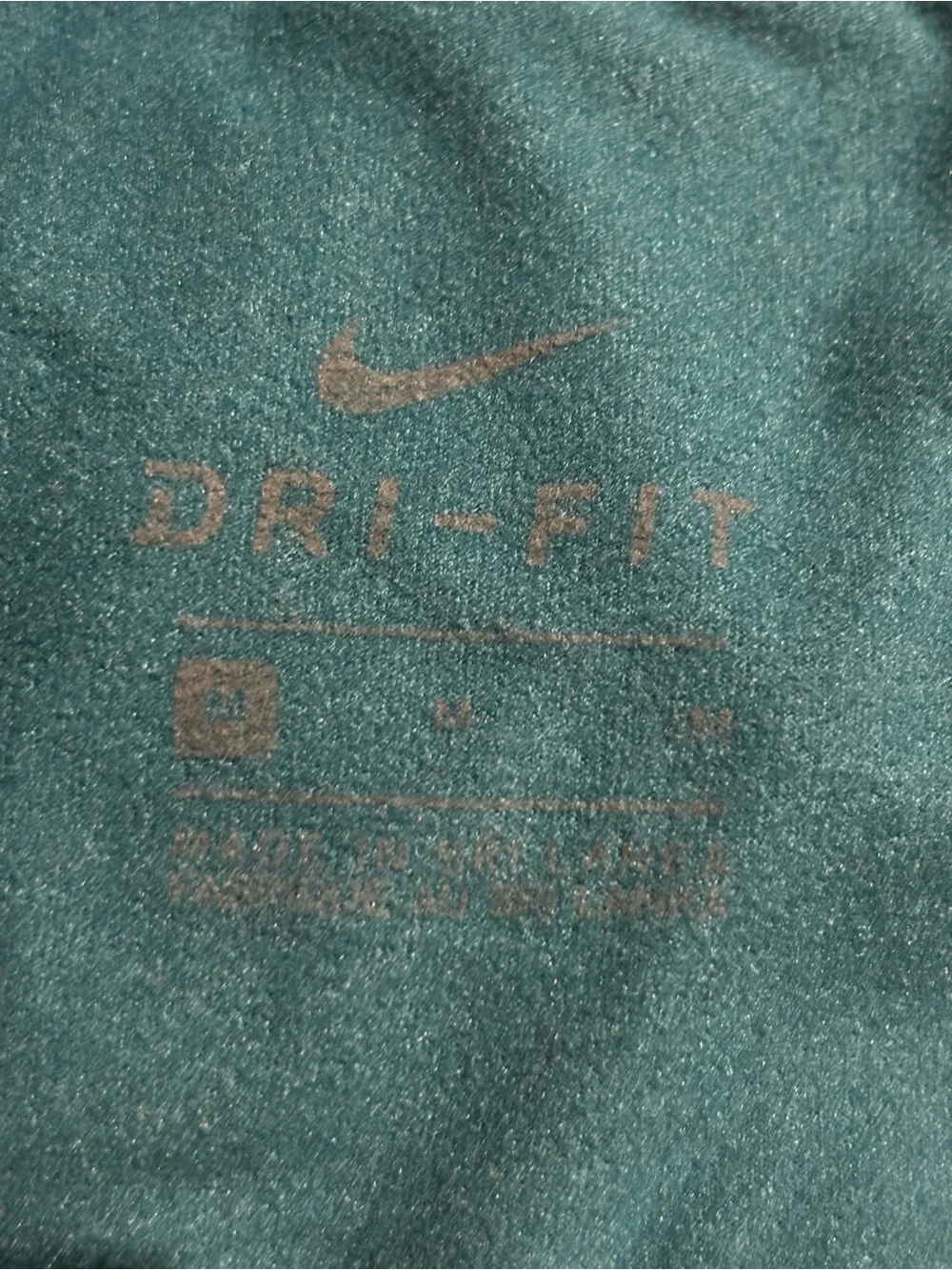 Nike Girls Black and Teal Patterned Leggings